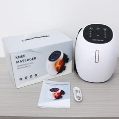 Cordless air-compression knee massager wrapped around a leg